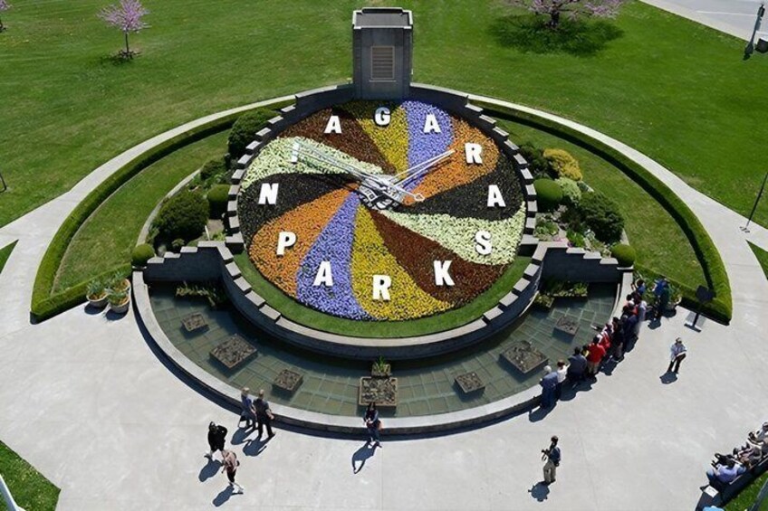 A circular plaza with a clock and the words 'AGAR PARKS' in the center. 3