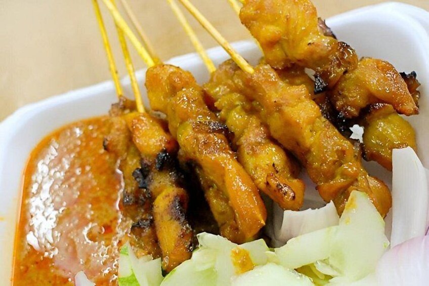 Grilled satay skewers with a peanut sauce. 5