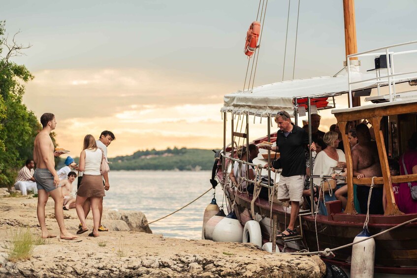 Picture 12 for Activity Rovinj: Sunset Lim Fjord Tour with BBQ, Swimming & Dolphins 3
