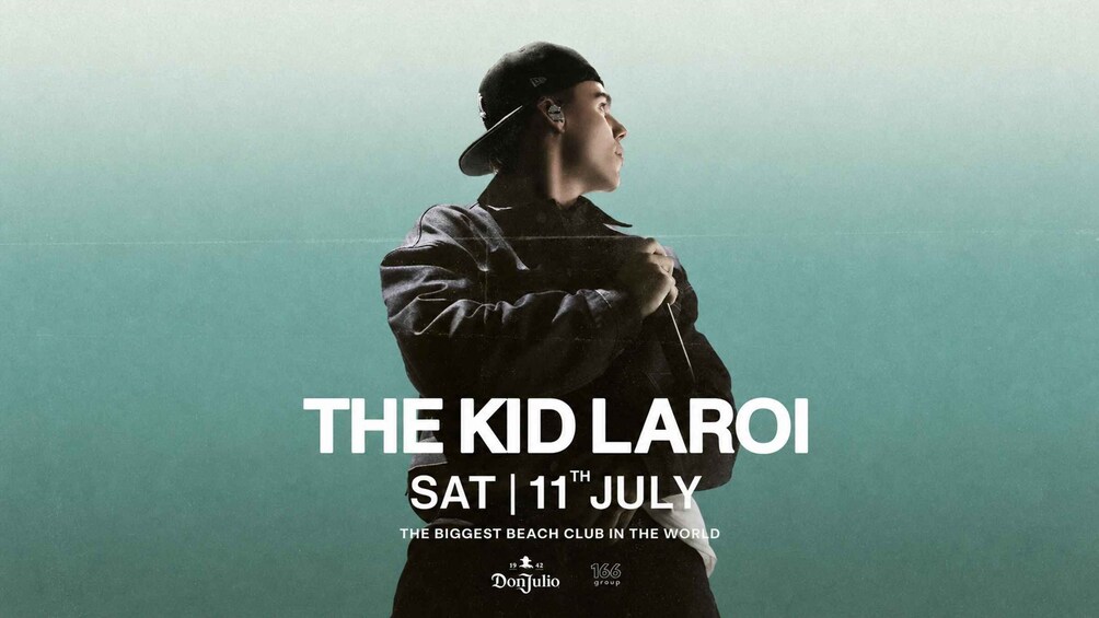 A person in a dark jacket and cap, with text indicating 'THE KID LAROI' and 'SAT 11TH JULY' against a teal background. 1