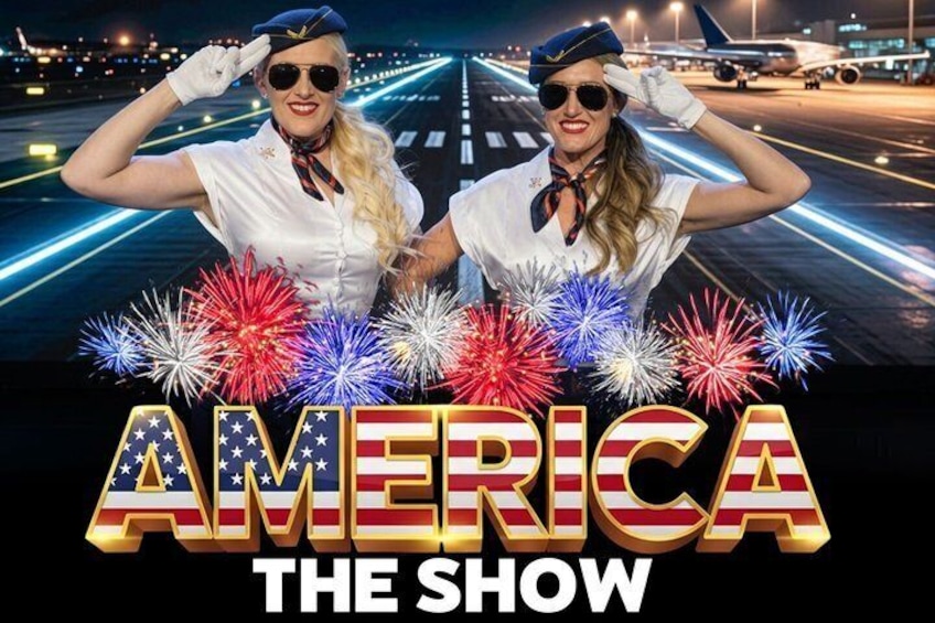 Two individuals in white uniforms with a runway and fireworks in the background. 1