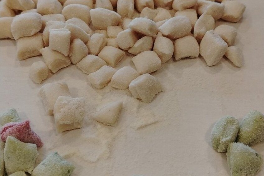 A pile of marshmallows on a surface. 3