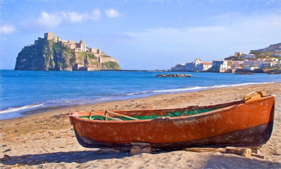 A beach with a boat, a castle on a cliff, and coastal buildings. 4