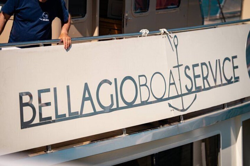 A boat with a sign that reads 'BELLAGIOBOAT SERVICE'. 2