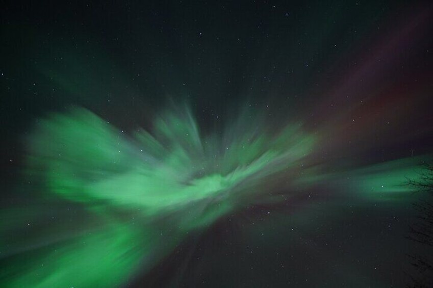 A night sky with green aurora borealis. 5