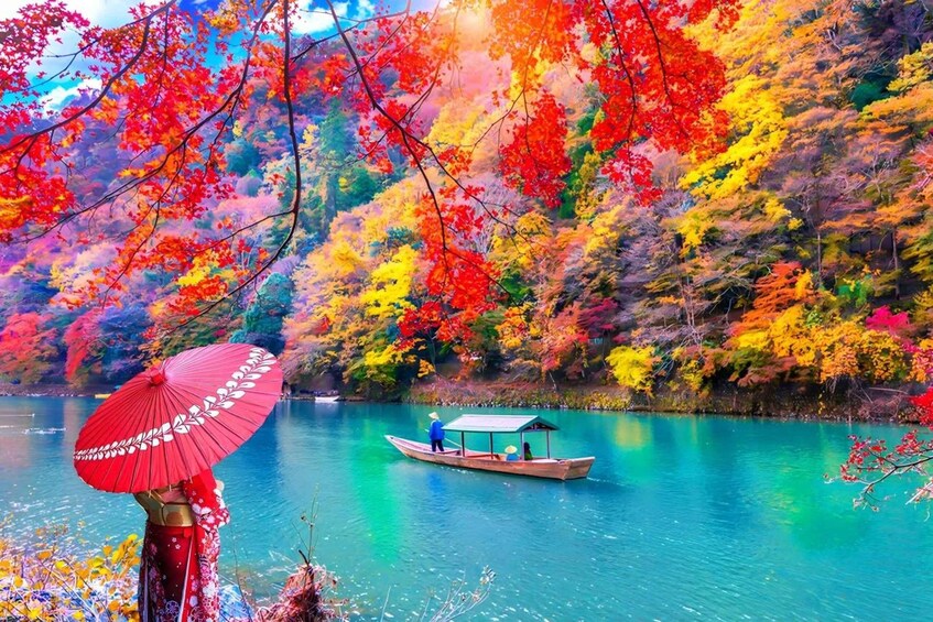 A boat on a lake surrounded by vibrant autumn foliage. 2