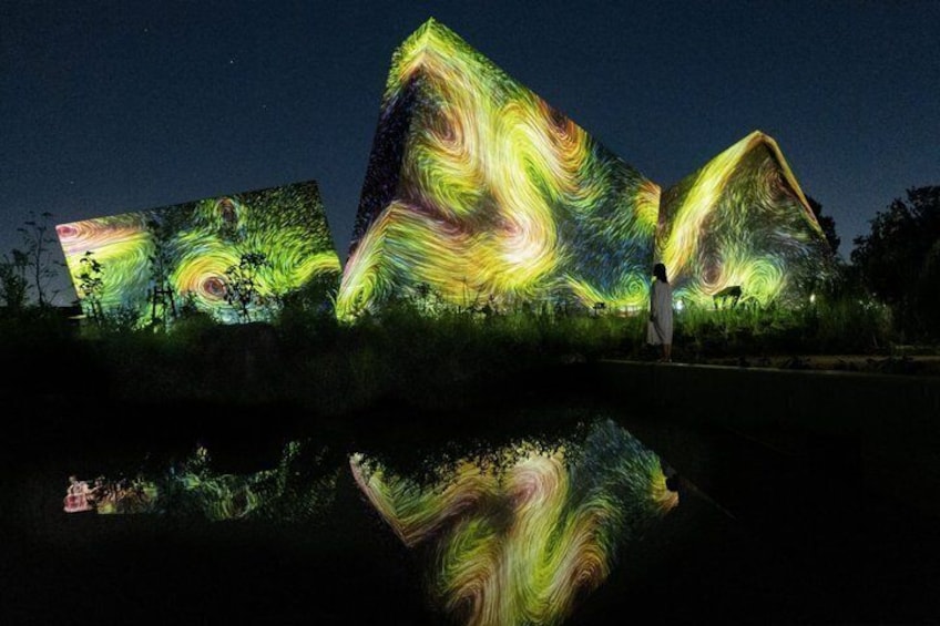 Illuminated structures with swirling patterns at night. 5