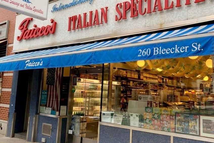 A storefront with a sign reading 'Faico's Italian Specialty' and '260 Bleeker St.' 1