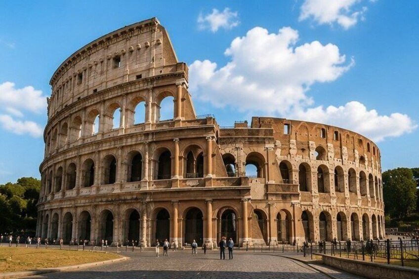 The Colosseum with multiple arches and visitors. 4