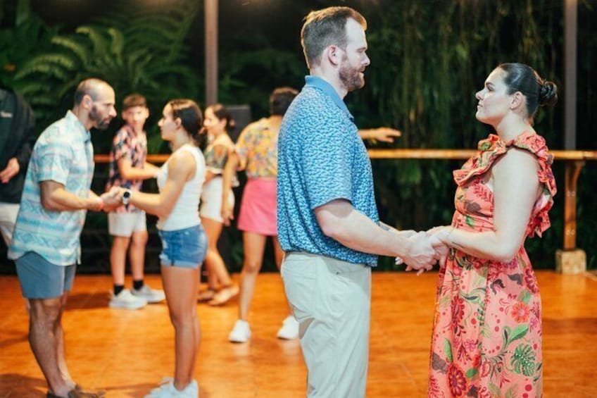 A dance floor with people dancing. 4