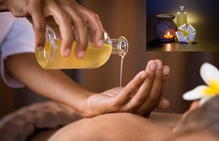 A person pouring a yellow liquid onto another person's foot. 1
