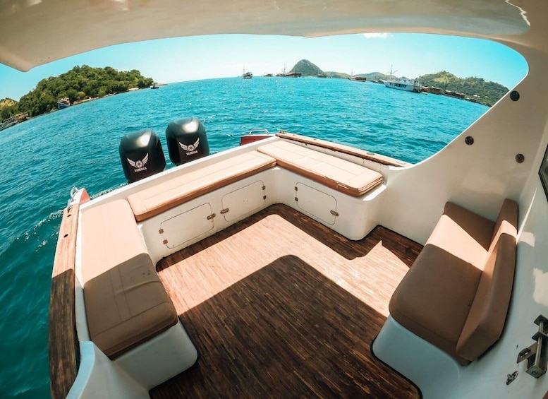 A boat's deck with seating and Yamaha outboard motors. 3