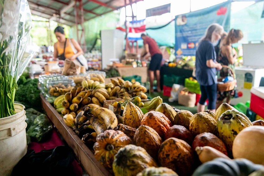 A market stall with various fruits and vegetables. 5