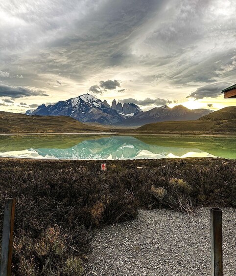 A mountain range with a lake in the foreground reflecting the peaks. 5