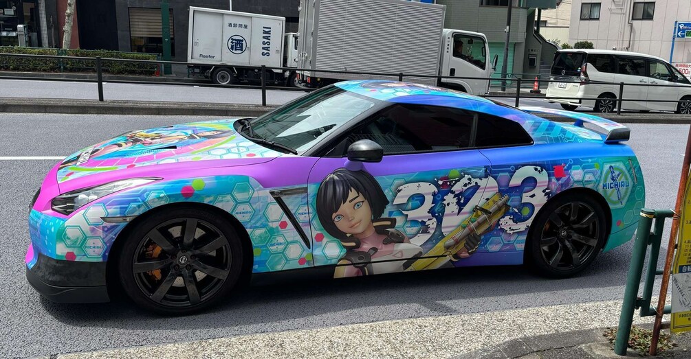 A colorful sports car with a detailed graphic design on its side. 5