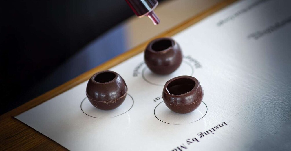 Three chocolate cups on a menu. 1
