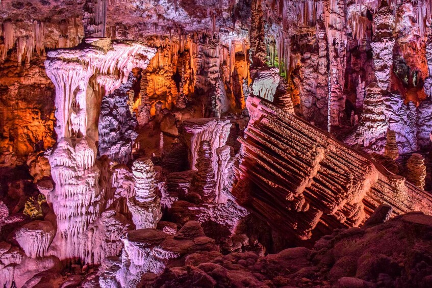 A cave with stalactites and stalagmites. 3