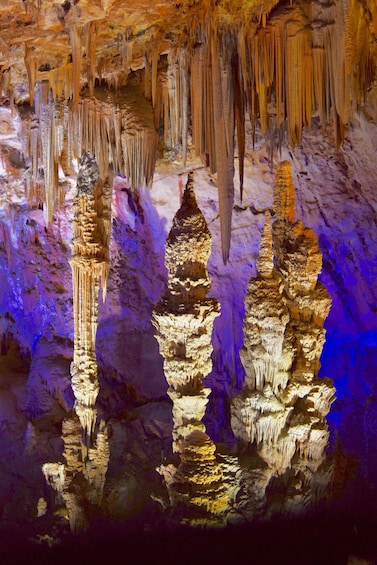 A cave with stalactites and stalagmites. 1