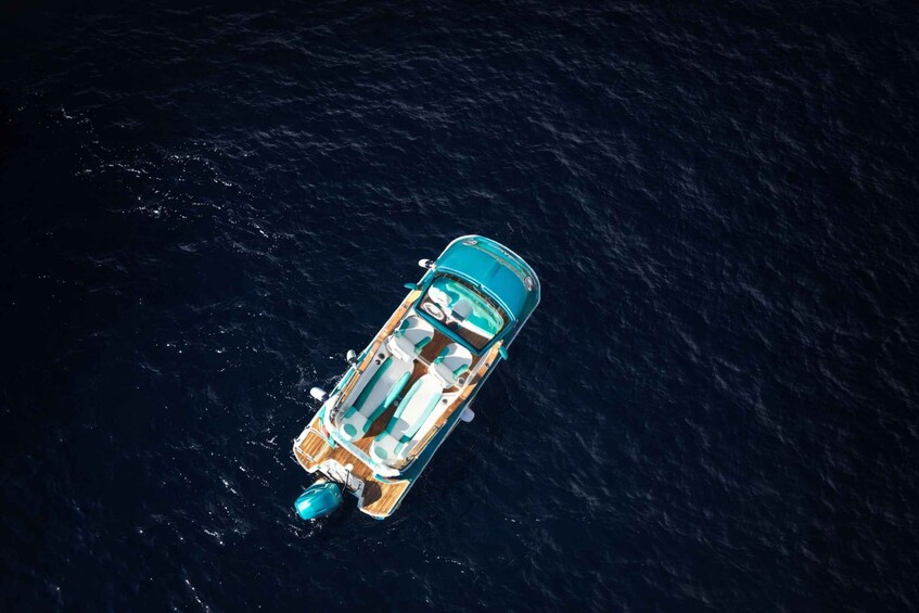 An aerial view of a boat on the water. 2