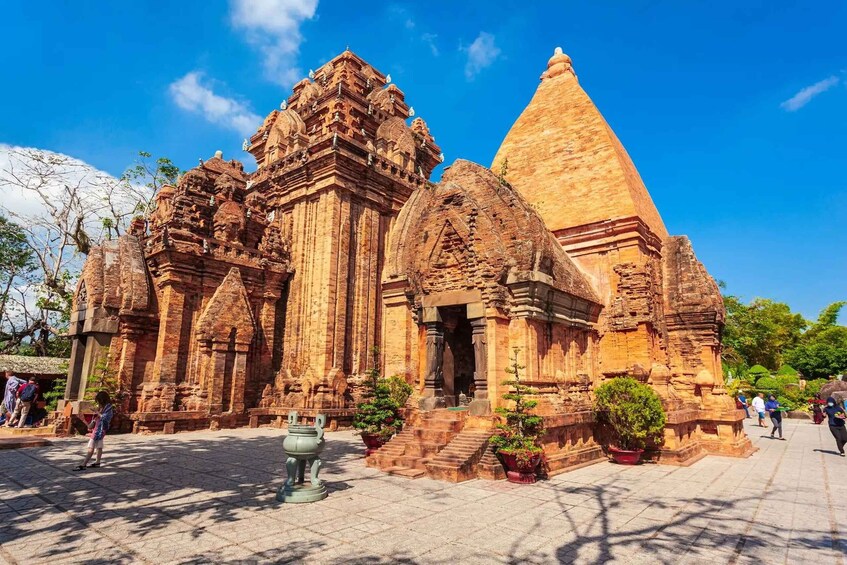 A large, intricately carved temple with a prominent pyramid-shaped structure. 3