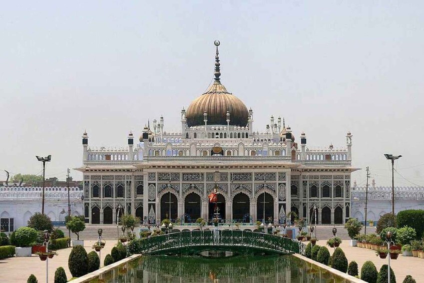 A large, ornate building with a prominent dome and intricate architectural details. 5