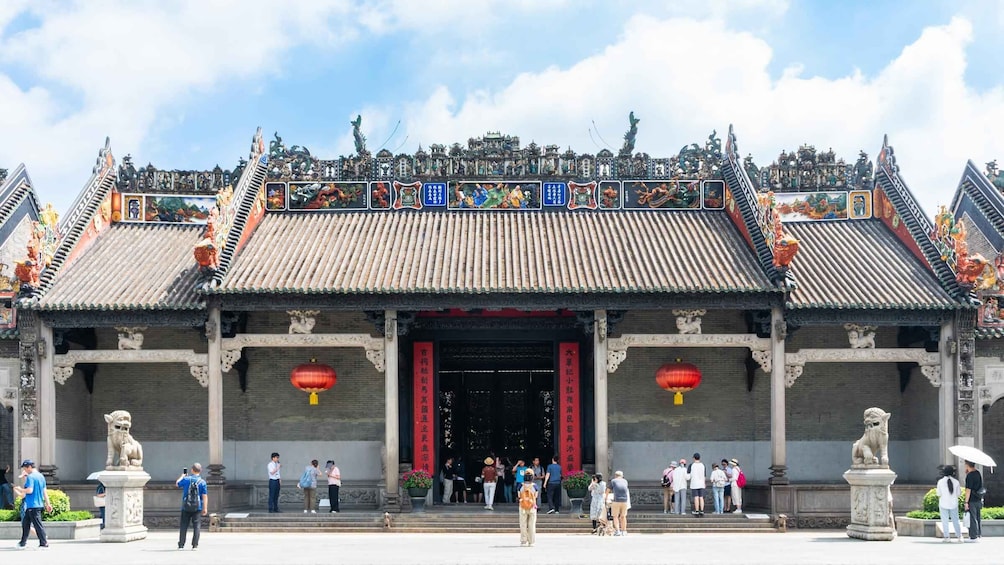 A traditional Chinese building with ornate decorations and red lanterns. 1