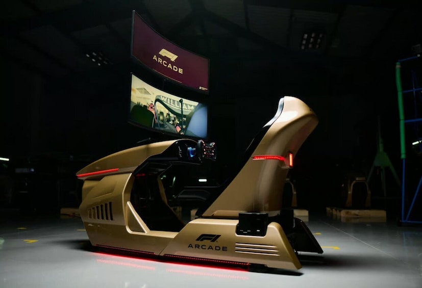 A futuristic vehicle with 'ARCADE' branding, a control panel, and a screen displaying a racing track. 4