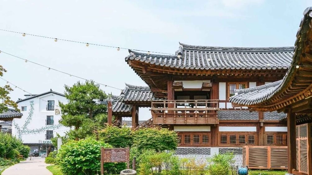 Traditional Korean architecture with tiled roofs and wooden structures. 3