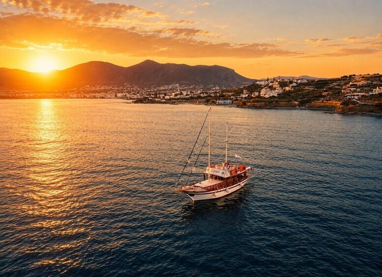 Hersonissos: Sunset Boat Cruise with Dinner & Swim stops 1
