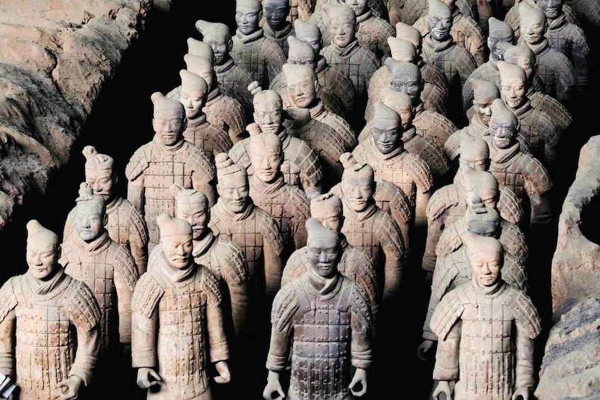 A large group of terracotta soldiers in a formation. 2