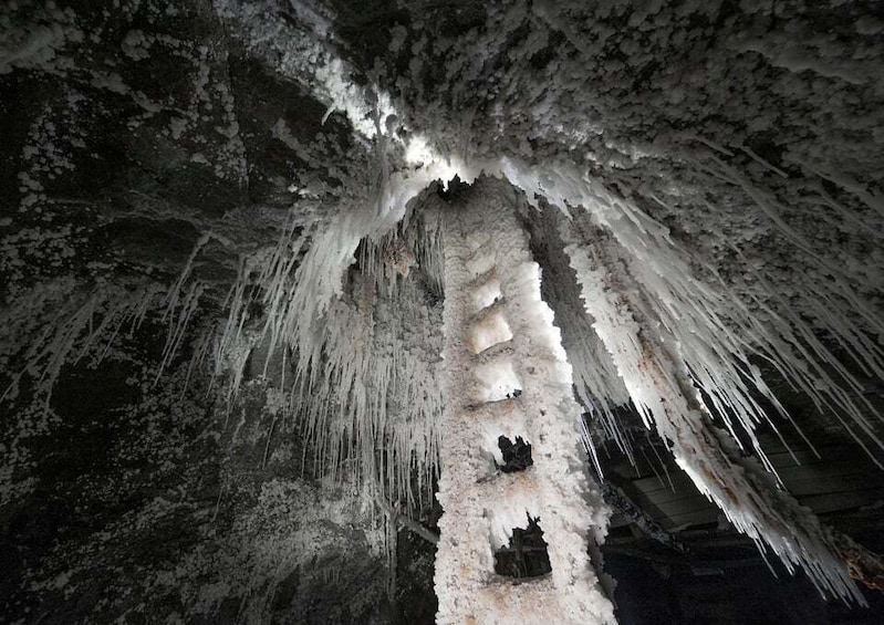 A cave with stalactites and stalagmites. 2