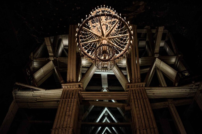 A large Ferris wheel with a complex structure of beams and supports. 3