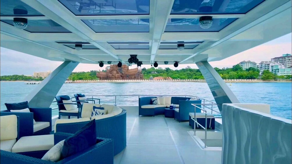 A boat deck with seating and surveillance cameras. 4