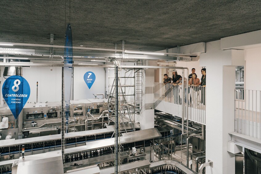 A control room with machinery and a blue sign with the number 8. 3