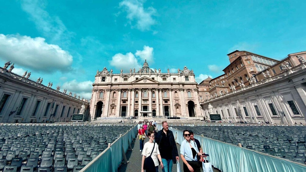 St. Peter's Basilica in Vatican City with its grand facade and large colonnade. 3