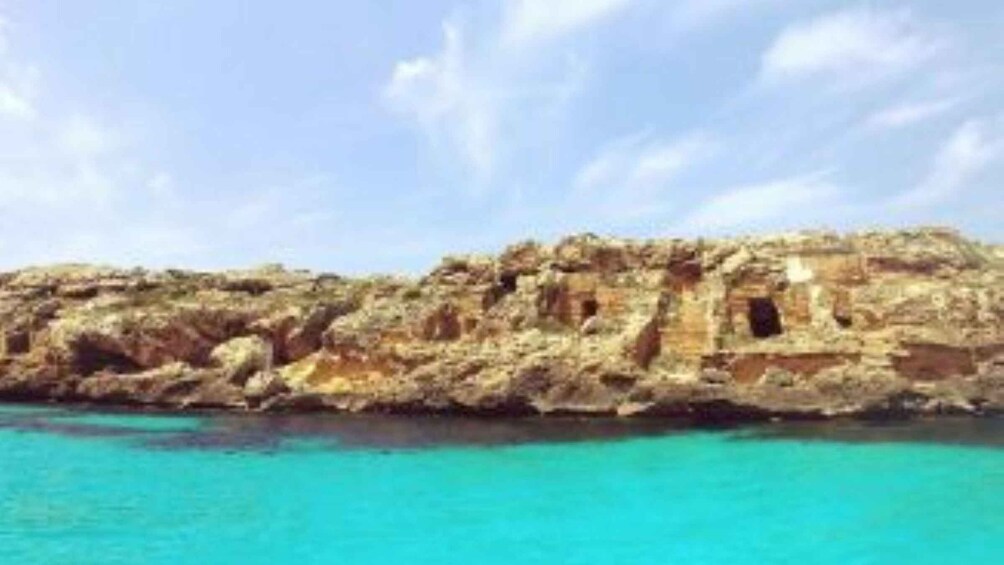 A coastal cliff with ancient ruins. 4