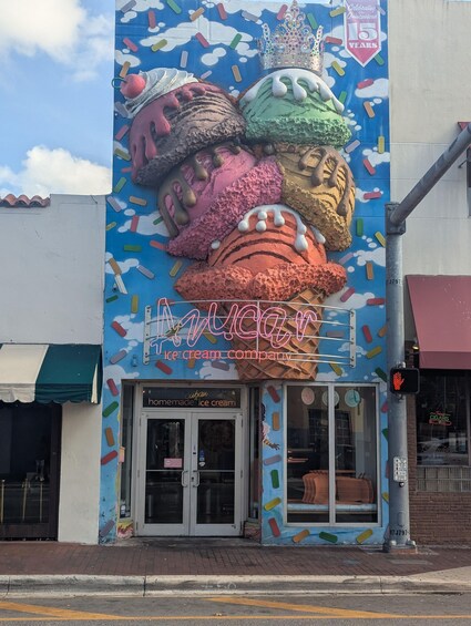A colorful mural of ice cream cones on a building. 3