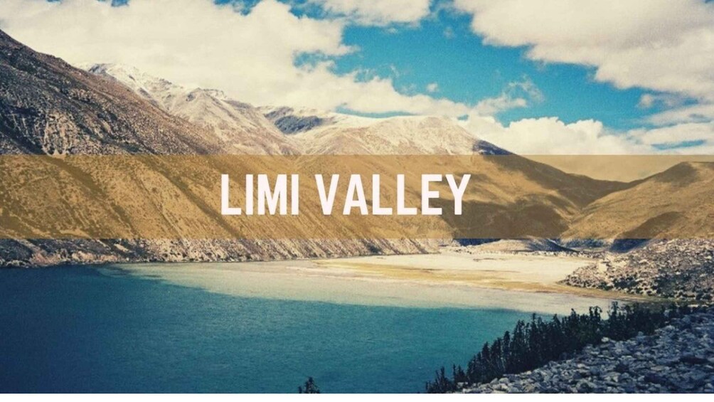 A mountainous landscape with a lake and the text 'LIMI VALLEY'. 1