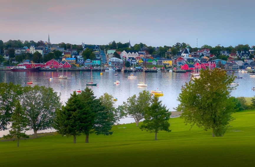 A harbor with colorful houses and boats. 5
