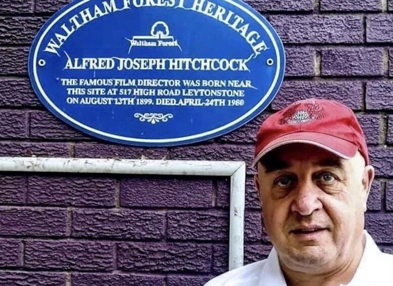 A blue plaque on a brick wall with the text 'Waltham Forest Heritage' and 'Alfred Joseph Hitchcock'. 5