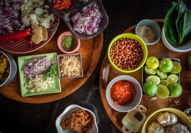 Various food ingredients and spices on a wooden table. 3