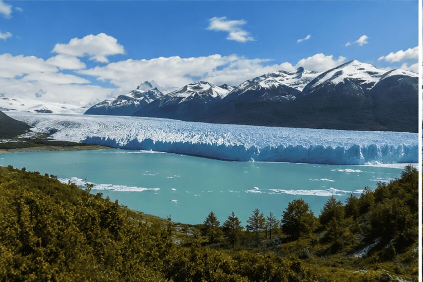 A glacier with turquoise water, snow-capped mountains, and dense green forest. 2