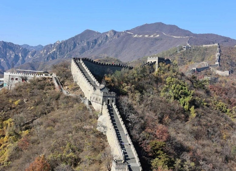 The Great Wall of China winding through a mountainous landscape. 5