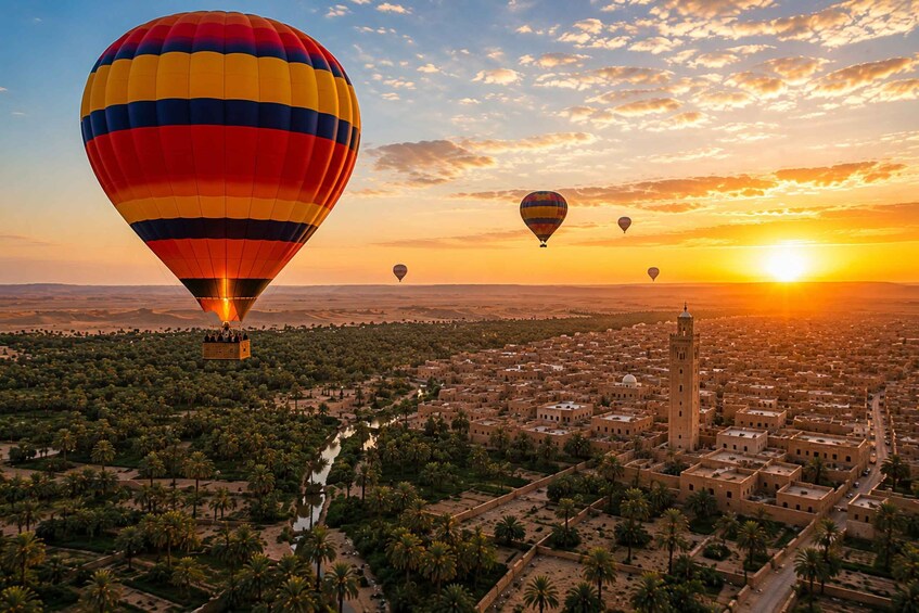 Hot air balloons over a city with palm trees and a river. 3