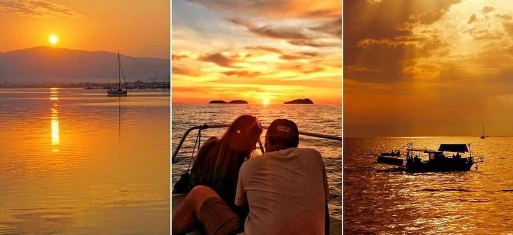 A sunset over calm waters with boats, a couple on a boat, and a distant shoreline. 1