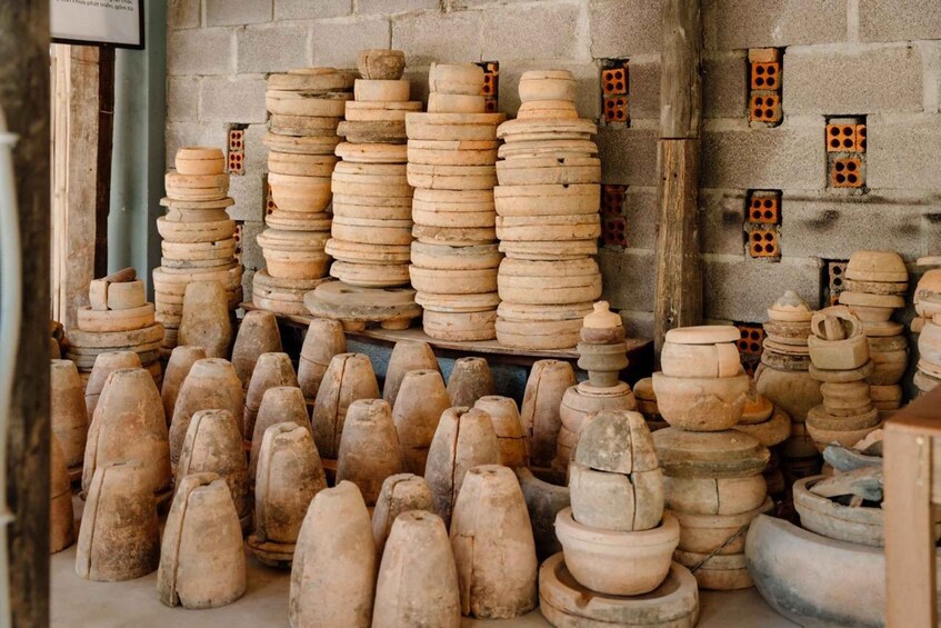 Stacks of pottery in a workshop. 5