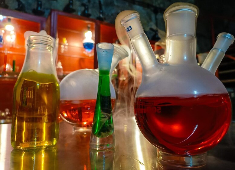 Laboratory glassware with colored liquids. 2