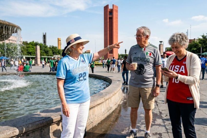 A fountain, a tall red tower, and people wearing sports jerseys. 5