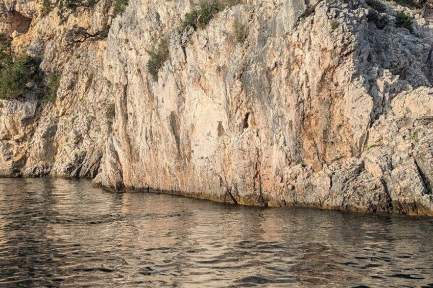 A rocky coastline with water. 3