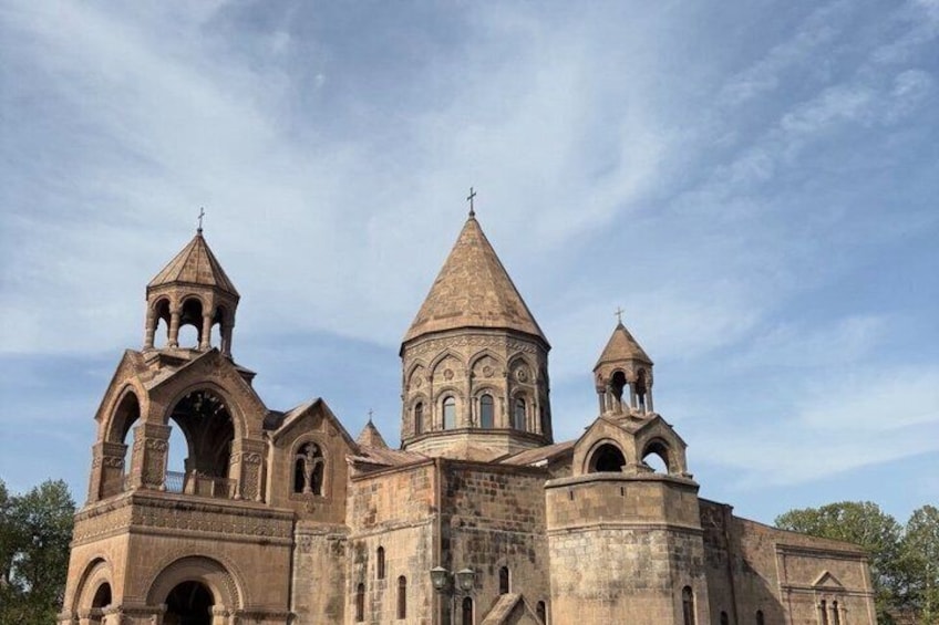 A historic church with multiple domes and bell towers. 2